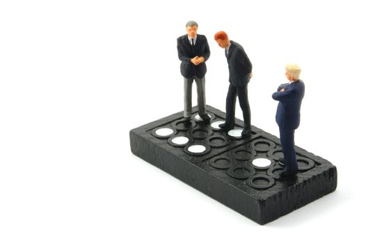 business man on domino isolated on white background