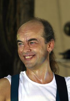 Smiling musician from group "Country saloon"