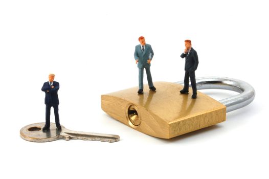 business man on secure pedlock isolated on white background