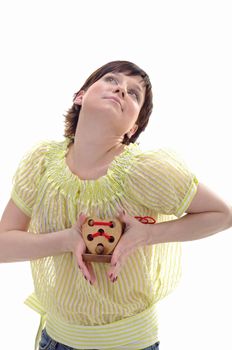 Woman with wooden toy heart in her hands 