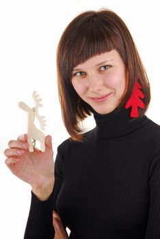 Young woman with new year tree as ear ring