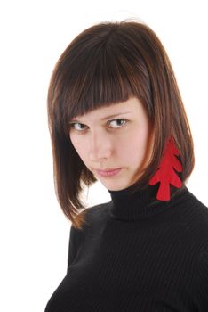 Young woman with new year tree as ear ring