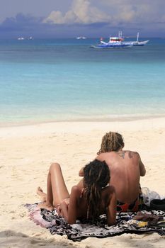 Young couple on the beach. Island Boracay. Philippines