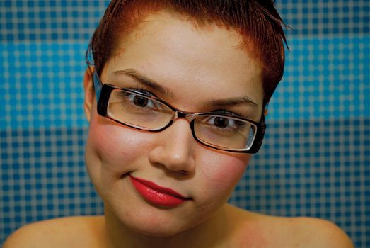 Girl with dyeing in glasses and red lips