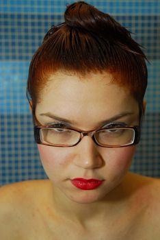 Girl with dyeing hair in glasses