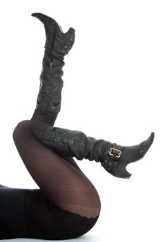 Woman legs on  black background