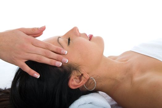masseuse does relax facial massage to the girl