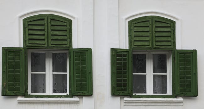 Traditional house's windows and wooden blinds-specific for Transylvanian Saxons architecture.