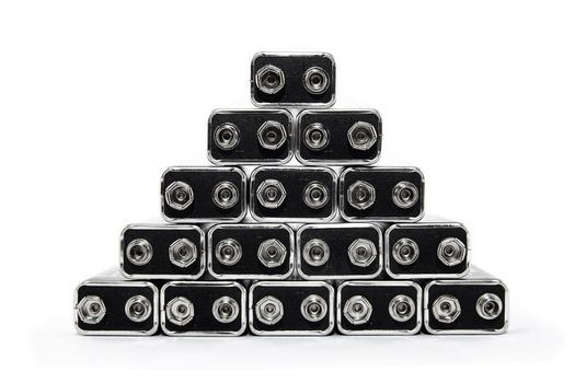 Nine volt batteries forming a pyramid, on white background.