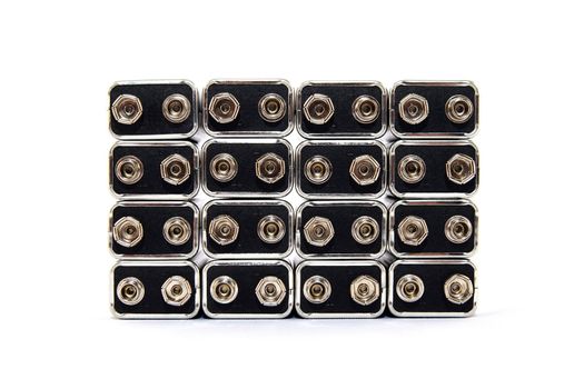 16 nine volt batteries forming a rectangle, on white background.