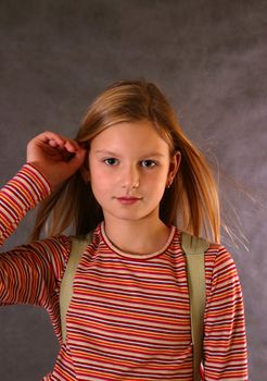 Portrait of the girl with fluttering hair 