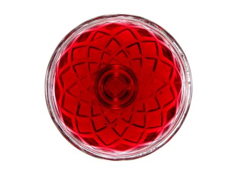 Sweet red jelly dessert in an old fashioned glass bowl, view from top