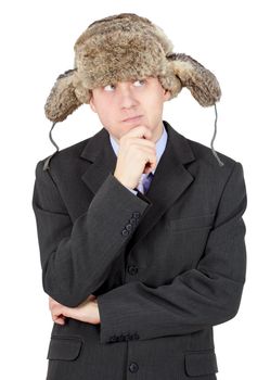 Thoughtful man on a white background with a winter hat on head