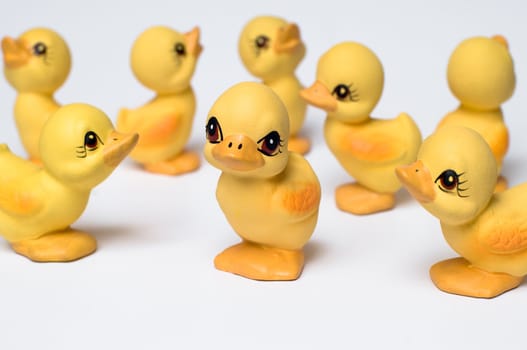 a group of duckling figurines
