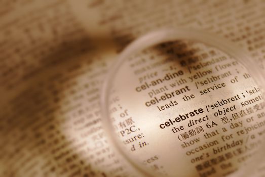 Find celebrate word in book (shallow DOF).