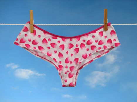 Valentine panties hanging on a clothes-line.