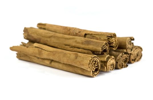 Cinnamon sticks isolated on white.