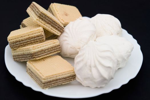 Souffle and waffles on a white plate