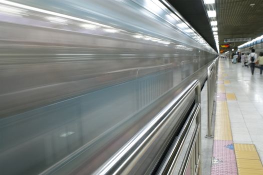 Rapid train arriving at seoul subway station in korea