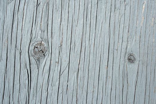 Painted cracked and knotty wood texture � detail of a wall.