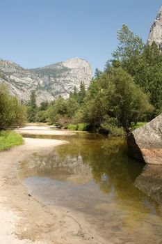 Mirror Lake is a lake in Yosemite National Park in California. This seasonal lake is close to disappearing due to sediment accumulation.