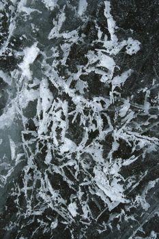 Frosty pattern on ice. Deep frozen river.