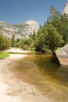 Mirror Lake is a lake in Yosemite National Park in California. This seasonal lake is close to disappearing due to sediment accumulation.