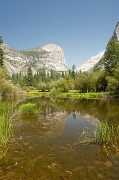 Mirror Lake is a lake in Yosemite National Park in California. This seasonal lake is close to disappearing due to sediment accumulation.