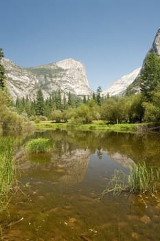Mirror Lake is a lake in Yosemite National Park in California. This seasonal lake is close to disappearing due to sediment accumulation.