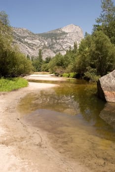 Mirror Lake is a lake in Yosemite National Park in California. This seasonal lake is close to disappearing due to sediment accumulation.