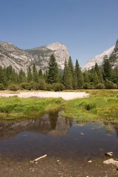 Mirror Lake is a lake in Yosemite National Park in California. This seasonal lake is close to disappearing due to sediment accumulation.