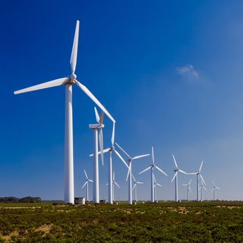 Wind turbines farm generating clean energy  trough the window
