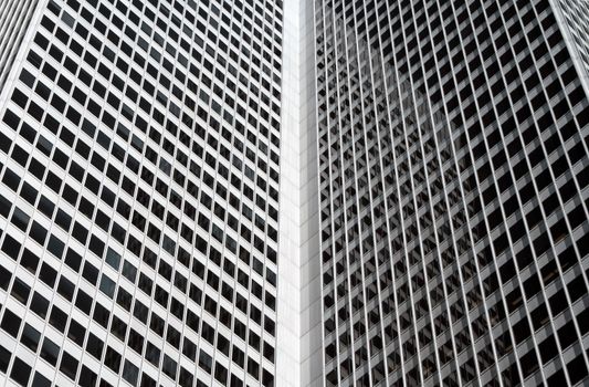 Inside corner of a corporate building, reminding an open book.