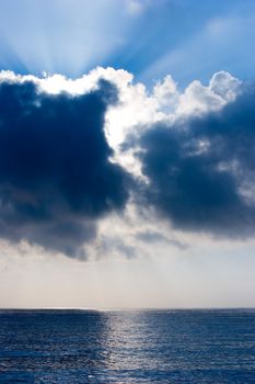 Picture of a beautiful beach with clouds covering the sun