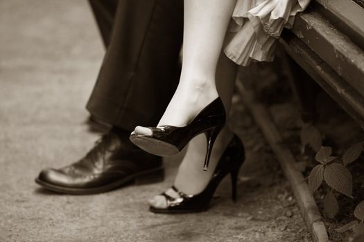 Legs of the groom and the bride