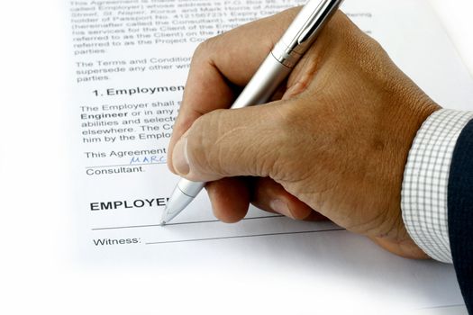 Employment Contact being signed by the employee