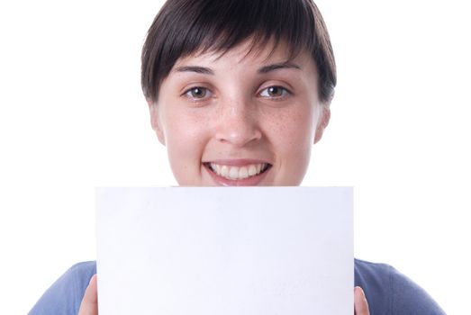 Young girl holding a card, close up