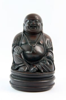 small black handcrafted buddha statue religious and decoration concepts