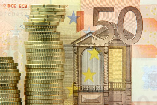 money background euro coins and fifty euro bank note focus for background 