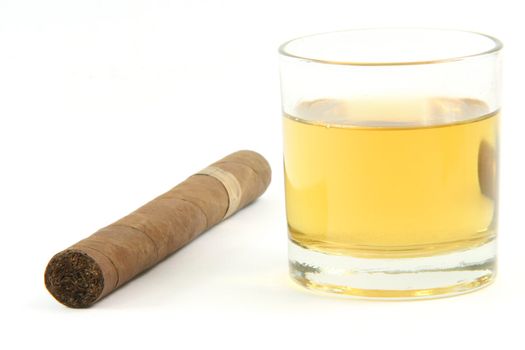 cigar and  whiskey glass isolated on white background