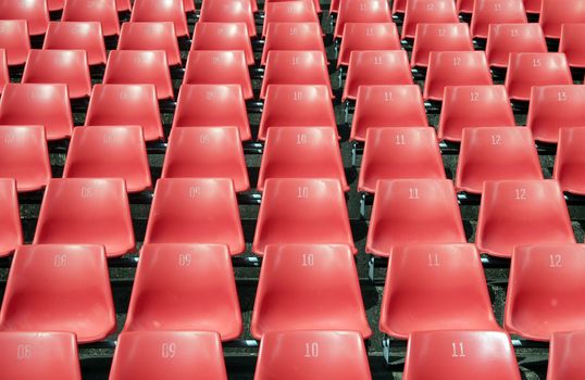 Many Empty Seats In Rows In An Outdoor Stadium