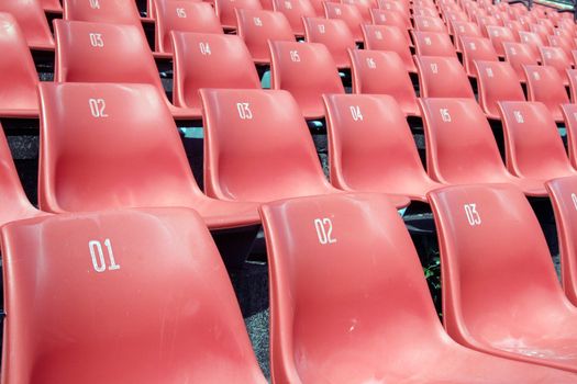 Many Empty Seats In Rows In An Outdoor Stadium