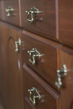 close-up of antique drawer handles
