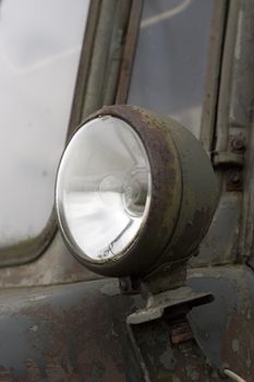 old rusted truck lamp