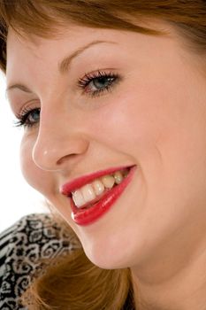 Smile of a beautiful young woman on white background