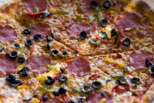pizza witha salami and olives