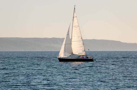 A sail boat, going under sail in Oslo Fjord.