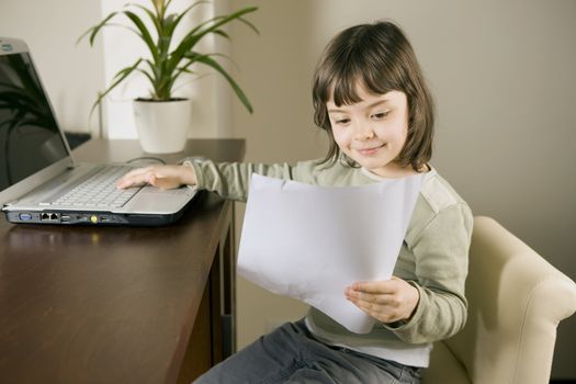 young child working in computer