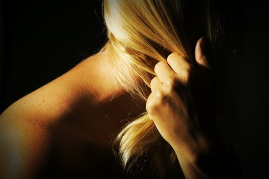 Abstract Blonde with Dramatic Lighting