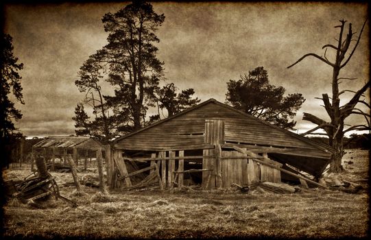sepia and grungy image of an old farm house